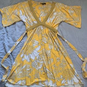 Yellow floral sundress with leather braided edge